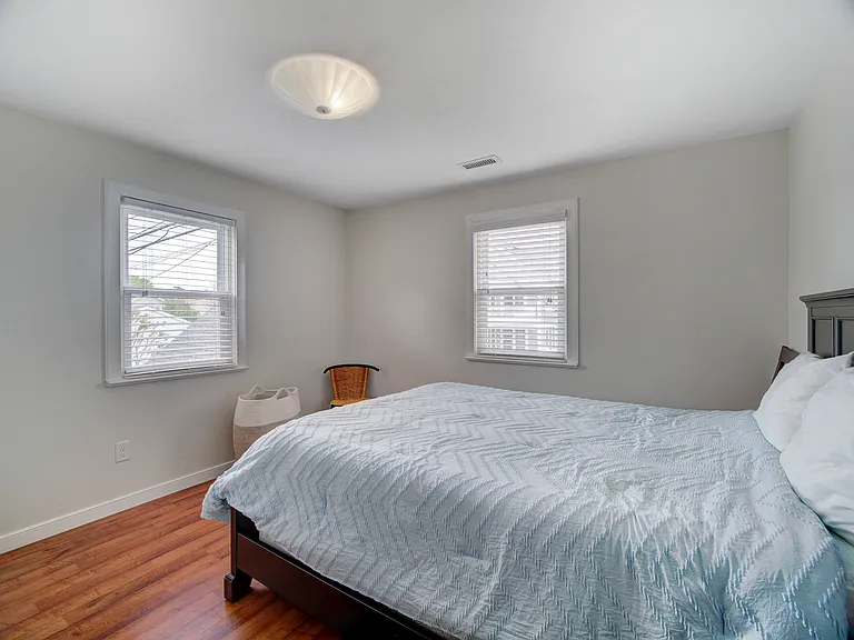 Bedroom 1 with double closet and queen size bed
