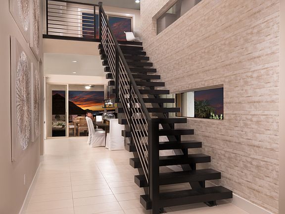 Dramatic Foyer with Floating Staircase