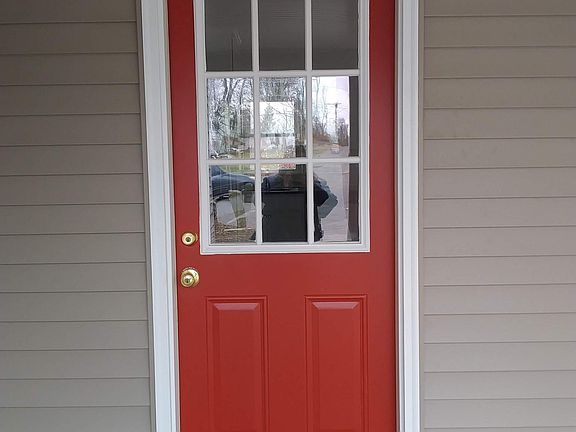 The color of this door really makes the house pop!