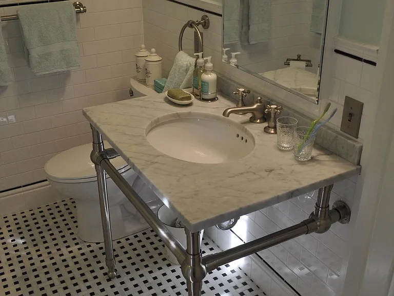 bathroom; basketweave marble floor