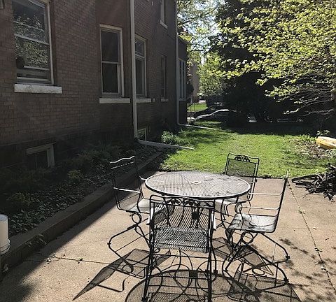 Side Patio and Yard for Grilling and Games