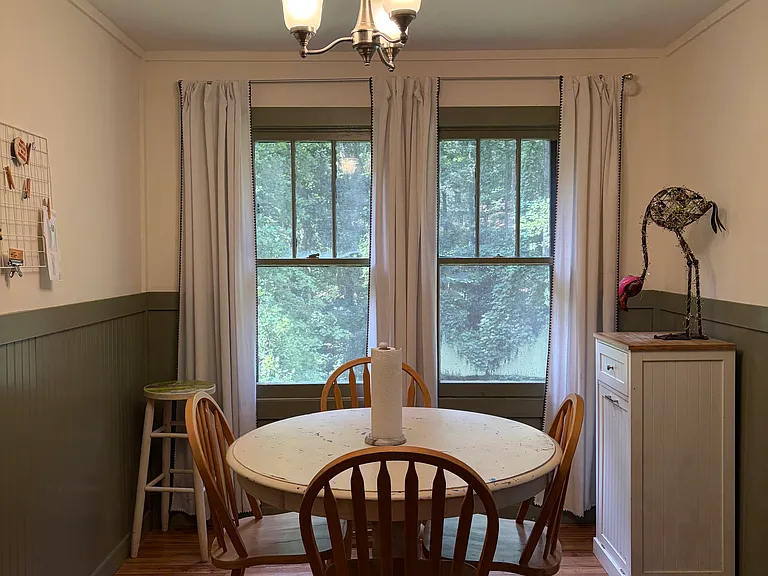 Dining nook between kitchen and living room