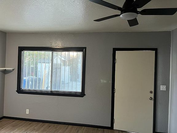 Main entrance door. Livingroom area, next to the kitchen.