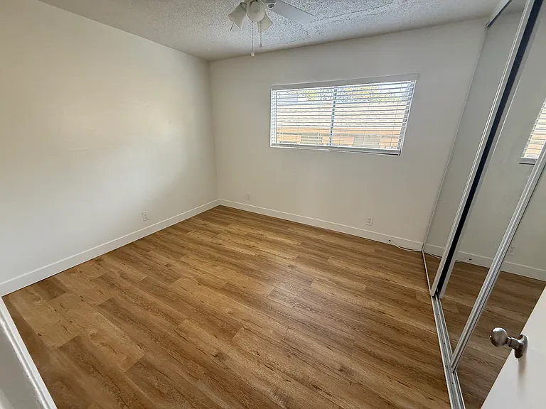 2nd Bedroom w/ Mirror Sliding Doors