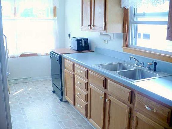 Kitchen: Another View Of Kitchen Looking To Back Yard