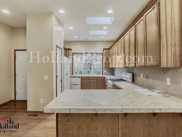 12712 SW Rocky Mountain Ct — Photo 28