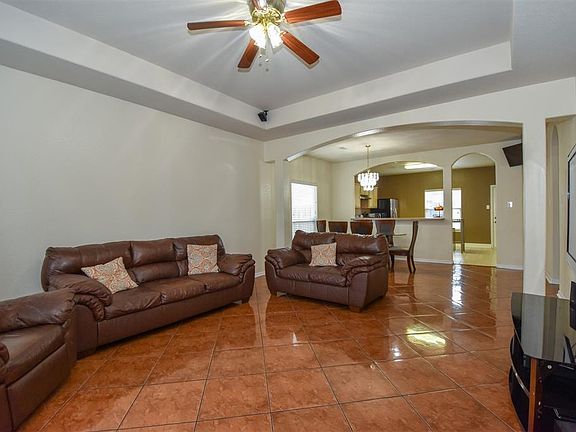 Upon entry, you are greeted with the formal living space! Very spacious for your sectionals, individual couches, accent chairs - the possibilities are endless. Pay close attention to the recessed ceiling's and freshly painted neutral colors on the wa