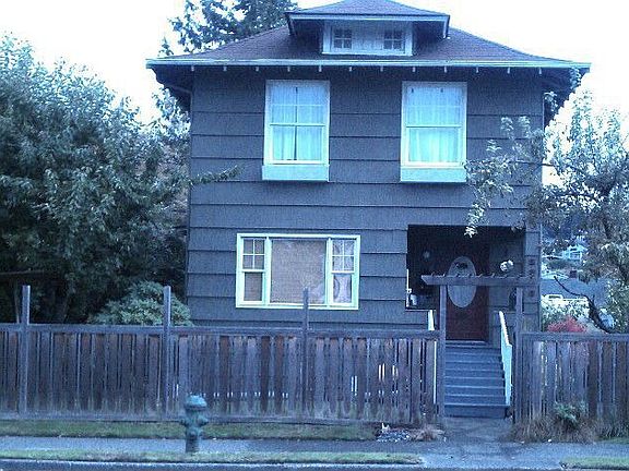 1908 historic Alki Farmhouse, large flat yard with mature fruit trees.