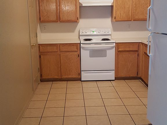 Tiled kitchen with large pantry