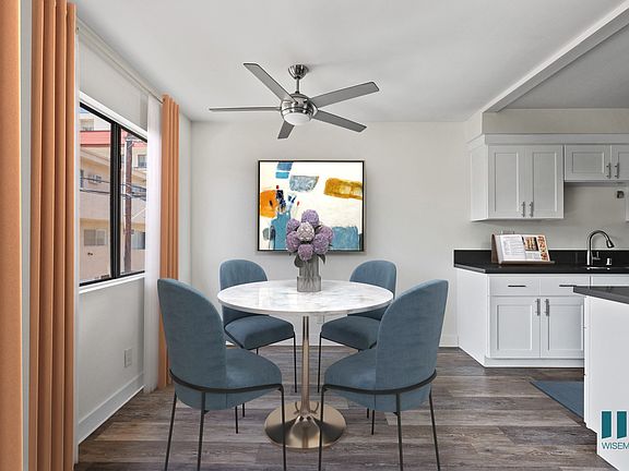 Dining Room with Large Windows and Vinyl Flooring