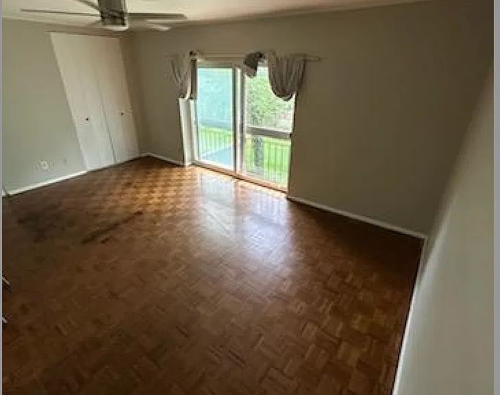 Giant Bedroom On has new ceiling fan and closet