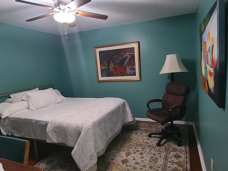 Second queen bedroom with walk-in closet and bureau