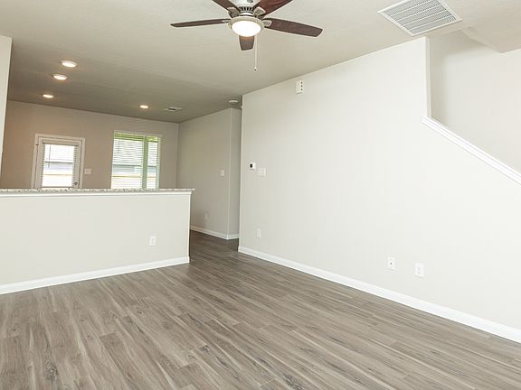Family Room to Kitchen and Dining Area