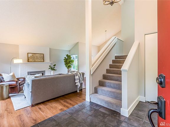 Welcome home! Soaring ceiling height and open concept living areas greet you as you enter.
