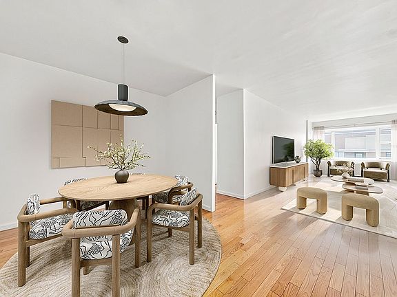 3rd image of 60 E 8th St APT 32A