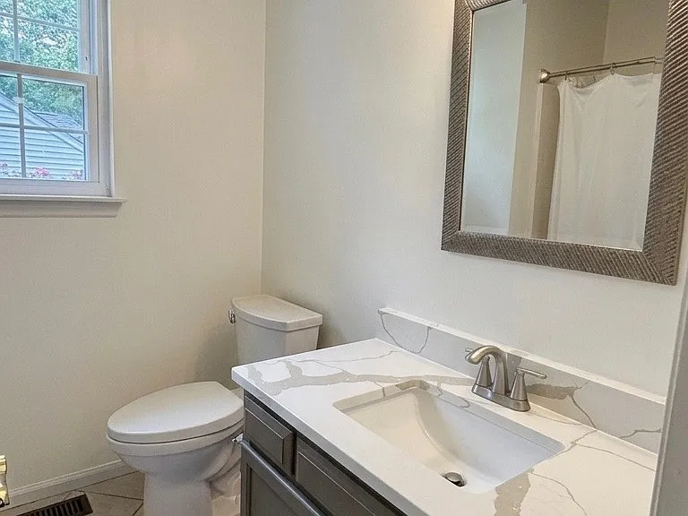 Hall Bath with premium quartz vanity tops