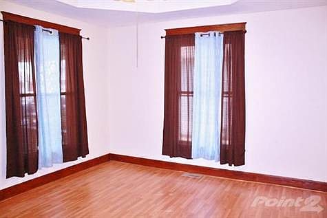 Living area has large windows for plenty of natural lighting!