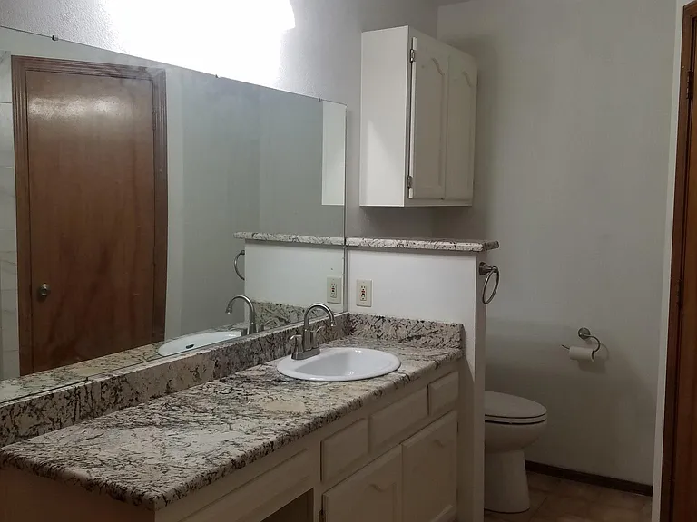 Large master bathroom. granite vanity