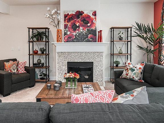 open great room with gas fireplace