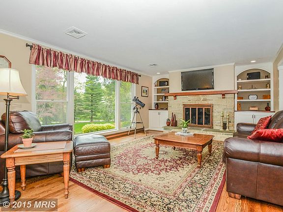 Refinished wood floors and fireplace