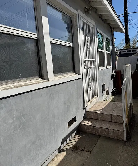 Second door entrance leads to living room
