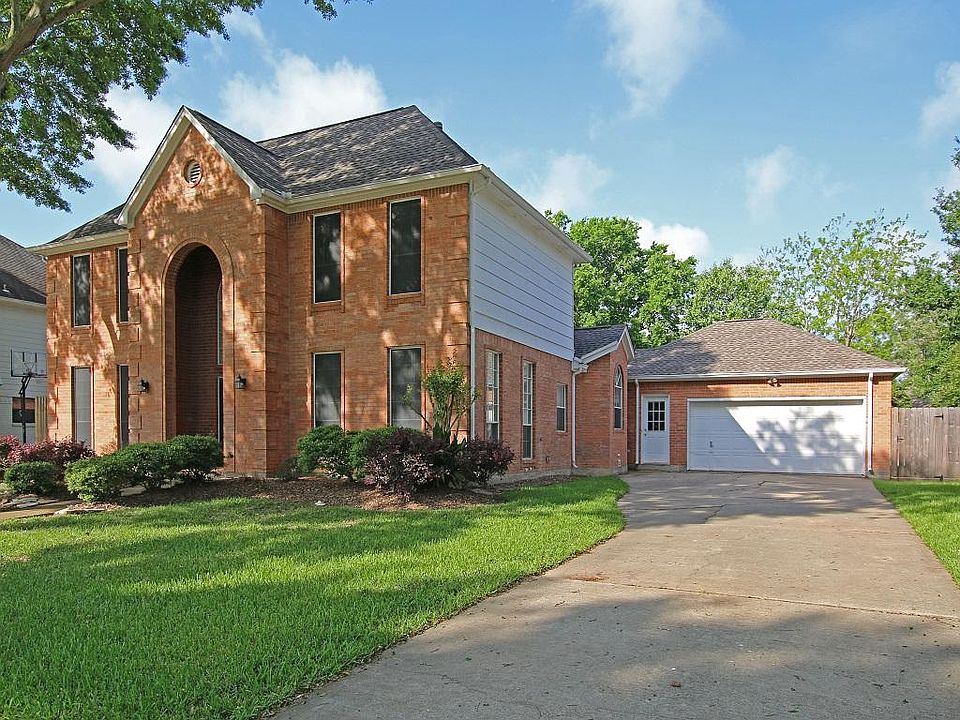 Lots of Mature Trees With a New Roof, Solar Screens, and an Over Sized Garage.
