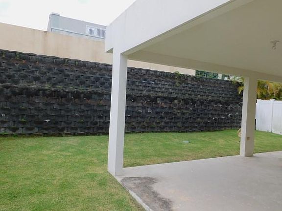 View of Backyard and Covered Concrete Terrace