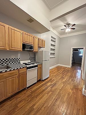 1st image of 302 E 3rd St APT 1D