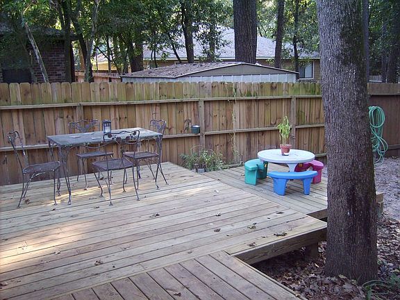 Deck wraps around house