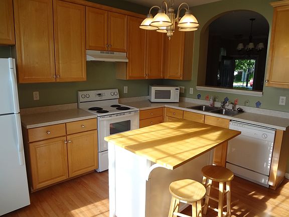 Kitchen with center island included.