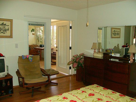 Master bedroom with French doors accessing Arizona Room