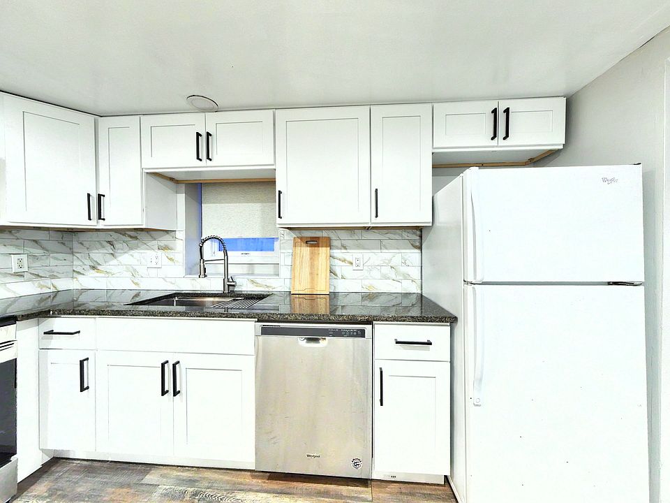 "Cook real meals in a full chef's kitchen with stainless steel appliances and a dishwasher."