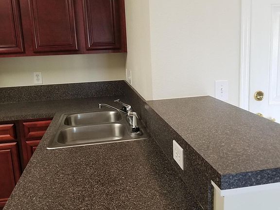 4th image of 6965 Ortega Woods Dr Unit 6-9