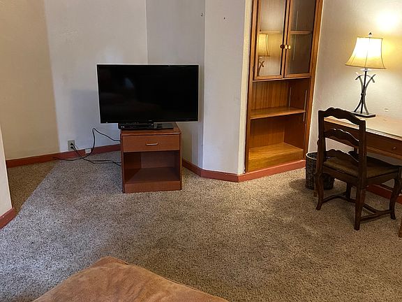 Living area with work space provided.