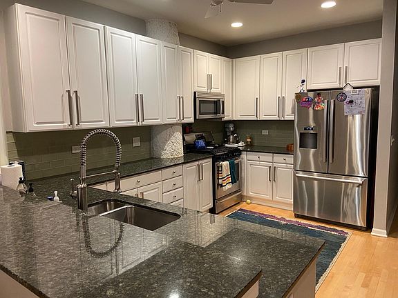 Updated kitchen, white cabinets, granite, Bosch stainless steel appliances