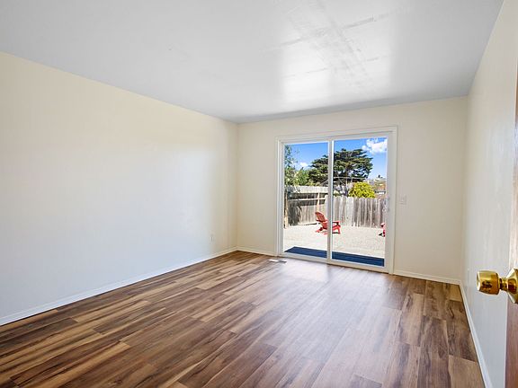 The master bedroom has its own sliding doors to the backyard