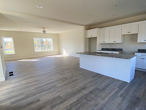 Open and bright kitchen, granite countertops, soft close drawers, 9ft ceilings and ceiling fan to match plenty of light coming in