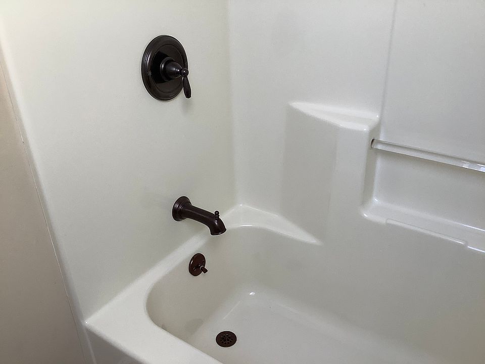 Bathtub with shower.