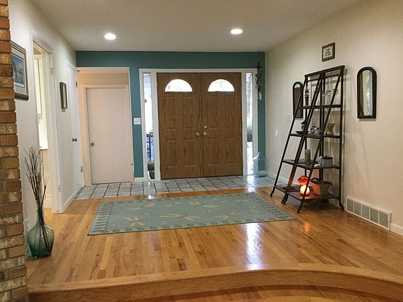 Warm entrance to greet your guests with solid hardwood floors