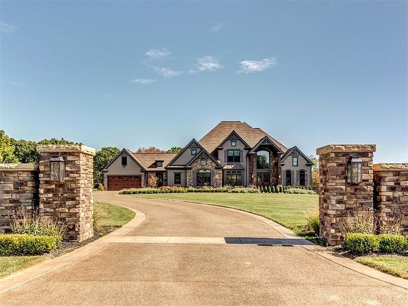 Spectacular Hardie Plank and Stone Exterior, 5 car heated garage, impressive 2 story covered front entry with massive wood timbe