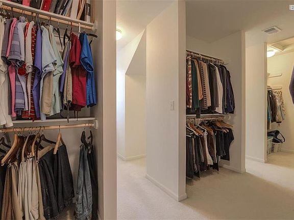 Master Bedroom closet as big as a bedroom, partial view