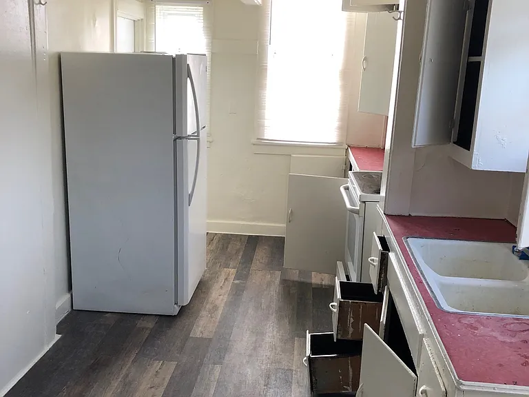 furnished from previous tenant to show scale and placement. tenants must provide appliances.