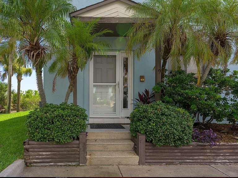 Private Entry with side yard