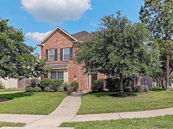 The home faces north for more energy efficiency. Pretty corner lot with mature trees on quiet tree lined cul de sac.
