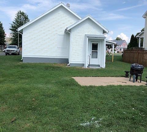 Rear of house with yard