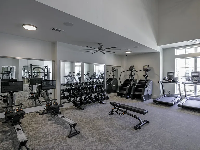 Elevate your fitness routine at Modera Walsh's HIIT-inspired fitness center, equipped with a TRX system and cutting-edge cardio equipment for a high-intensity workout experience.
