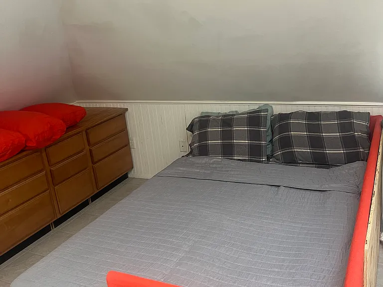 Attic bedroom: pull-out couch that turns into a queen bed