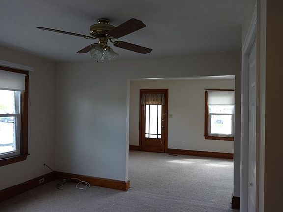 Dining room into living room and front door.