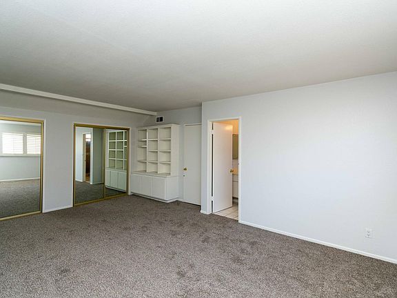 Master Bedroom with large closets and built in book case.