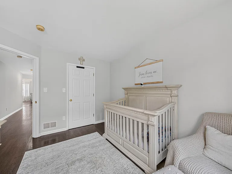 Bright Bedroom with Large Windows and Walk-In Closet